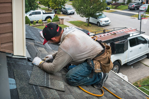 Professional Roofing technician working in Dunnsville, VA